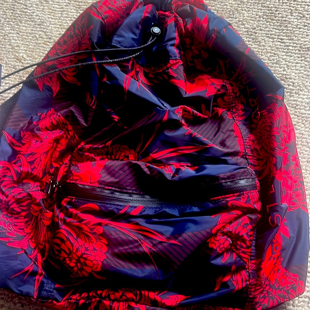 Like new Stella McCarney by Adidas backpack zips into a pouch !